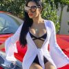 Direto do Tudo Pop: UAU! Simaria ostenta de biquíni em carrão de luxo(Reprodução/TudoPop)